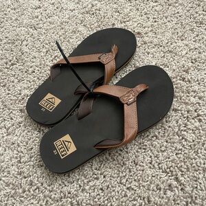 Reef Dark Brown and Black Flip Flops